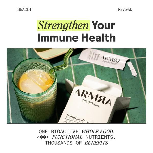 A high-quality lifestyle shot featuring a colostrum drink prepared on a tiled surface, emphasizing the product's benefits through clean, bright imagery.
